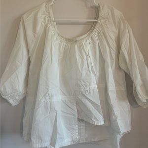 Apiece Apart lightweight shirt, can be worn on or off the shoulder.